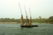 Three feluccas in a sandstorm