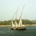 Three feluccas in a sandstorm